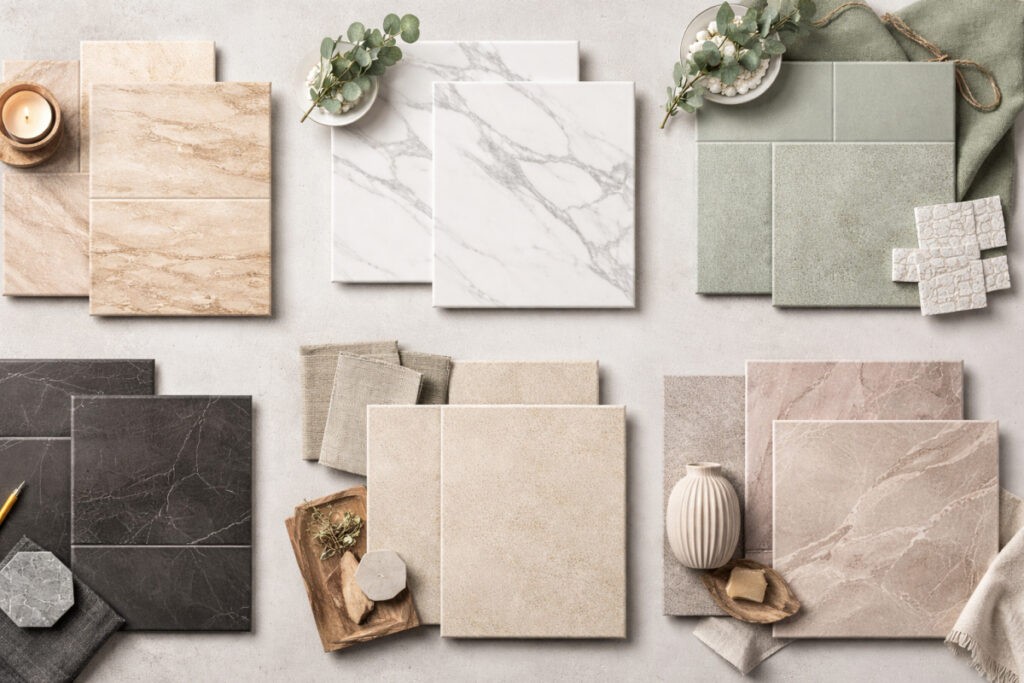 Kataloški prikaz različitih keramičkih pločica u neutralnim tonovima, sa imitacijom mermera, kamena i betona
